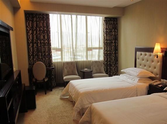 Vienna Hotel In Pinghu Square Shénzhen Habitación foto